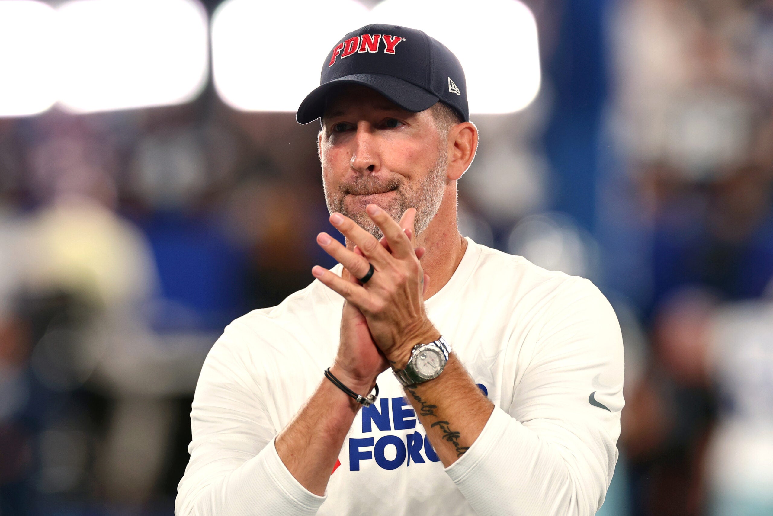 Sep 13, 2026; East Rutherford, New Jersey, USA; Dallas Cowboys head coach Brian Schottenheimer looks on during warmups prior to the game against the Dallas Cowboys at MetLife Stadium.