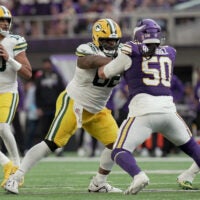 Green Bay Packers center Jacob Monk (62) blocks Minnesota Vikings defensive tackle Levi Drake Rodriguez (50) while quarterback Jordan Love (10) drops back to pass during the fourth quarter of their game Sunday, Sept. 13, 2026 at U.S. Bank Stadium in Minneapolis, Minnesota. The Minnesota Vikings beat the Green Bay Packers 39-22.