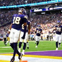 Sep 13, 2026; Minneapolis, Minnesota, USA; Minnesota Vikings wide receiver Justin Jefferson (18) celebrates after a touchdown during the second half against the Green Bay Packers at U.S. Bank Stadium.
