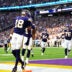 Sep 13, 2026; Minneapolis, Minnesota, USA; Minnesota Vikings wide receiver Justin Jefferson (18) celebrates after a touchdown during the second half against the Green Bay Packers at U.S. Bank Stadium.