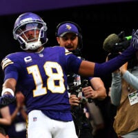 Sep 13, 2026; Minneapolis, Minnesota, USA; Minnesota Vikings wide receiver Justin Jefferson (18) celebrates after a touchdown during the second half against the Green Bay Packers at U.S. Bank Stadium.