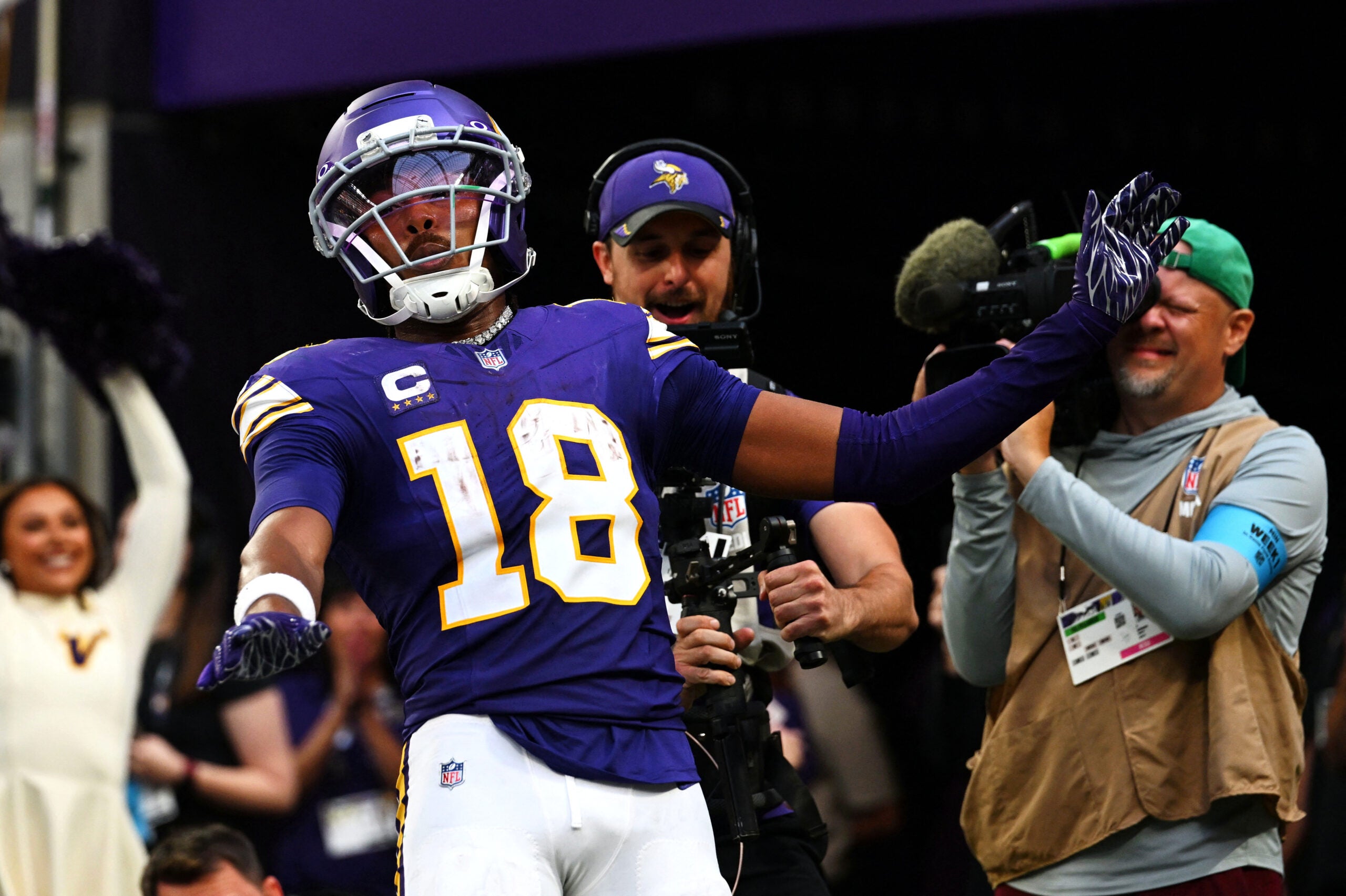 Sep 13, 2026; Minneapolis, Minnesota, USA; Minnesota Vikings wide receiver Justin Jefferson (18) celebrates after a touchdown during the second half against the Green Bay Packers at U.S. Bank Stadium.
