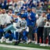 New York Giants quarterback Jaxson Dart (6) is hit out of bounds by Dallas Cowboys linebacker DeMarvion Overshown (0) during a week one opening game between the New York Giants and Dallas Cowboys at Metlife Stadium on Sunday, Sept. 13, 2026, in East Rutherford, NJ.