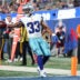 Sep 13, 2026; East Rutherford, New Jersey, USA; Dallas Cowboys running back Javonte Williams (33) carries the ball for a touchdown against the New York Giants during the fourth quarter at MetLife Stadium.