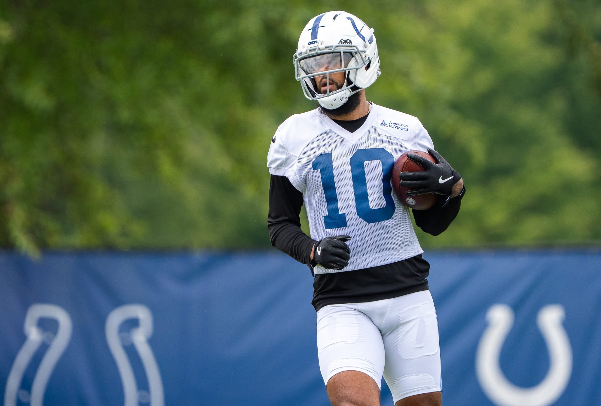 Indianapolis Colts wide receiver Keenan Allen (10) pulls in a pass Wednesday, Aug. 26, 2026, during practice at Indiana Farm Bureau Football Center.