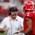 Georgia coach Kirby Smart celebrates with Georgia running back Kendall Milton (2) after he scored a touchdown during the first half of an NCAA college football game between Arkansas and Georgia in Athens, Ga., on Saturday, Oct. 2, 2021.