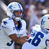 Sep 19, 2026; College Station, Texas, USA; Kentucky Wildcats quarterback Kenny Minchey (3) hands off the ball to running back Jason Patterson (26) during the second quarter against the Texas A&M Aggies at Kyle Field.