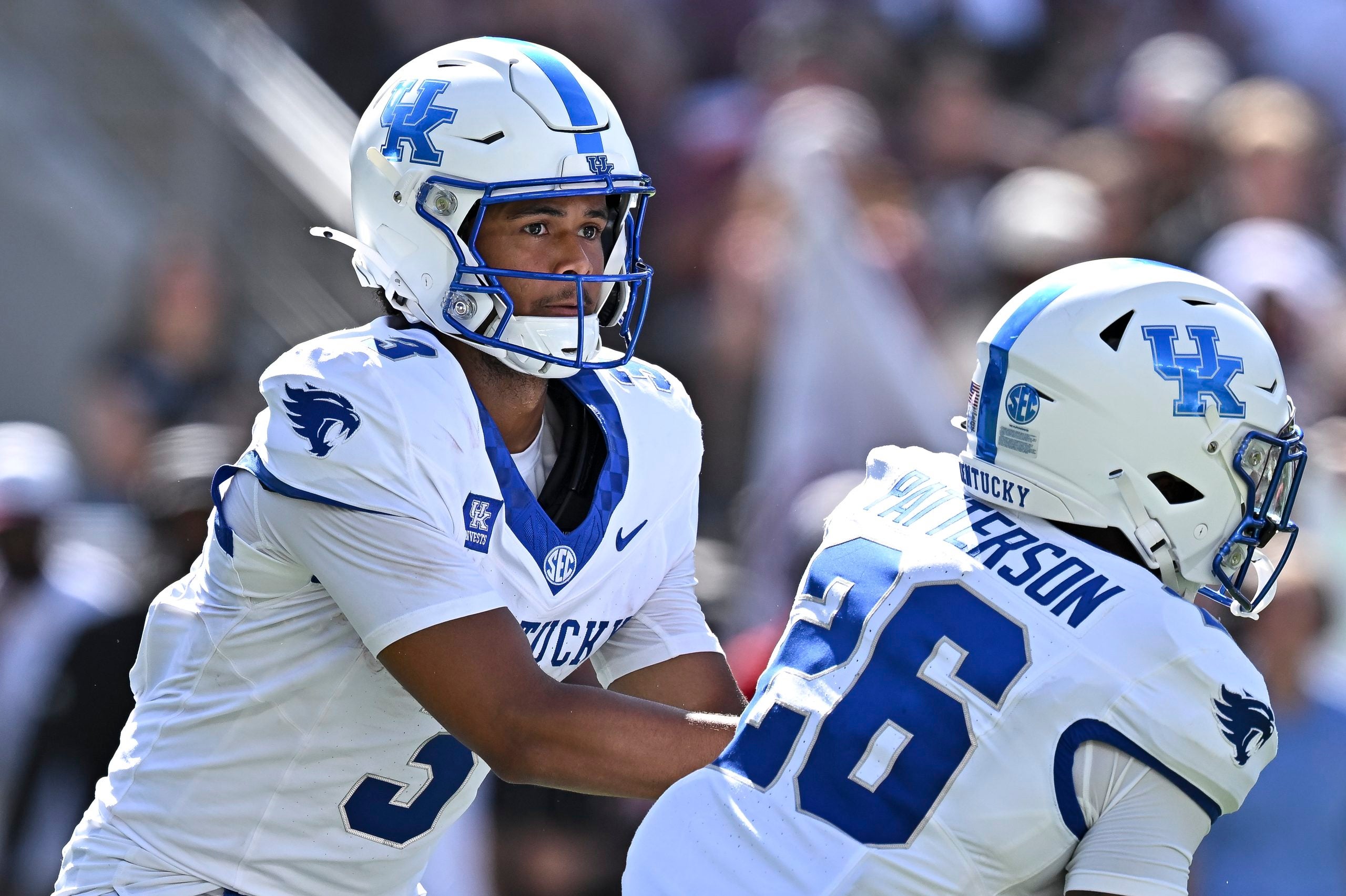 Sep 19, 2026; College Station, Texas, USA; Kentucky Wildcats quarterback Kenny Minchey (3) hands off the ball to running back Jason Patterson (26) during the second quarter against the Texas A&M Aggies at Kyle Field.