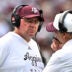 Sep 19, 2026; College Station, Texas, USA; Texas A&M Aggies head coach Mike Elko speaks with a member of his coaching staff during a time-out in the fourth quarter against the Kentucky Wildcats at Kyle Field.