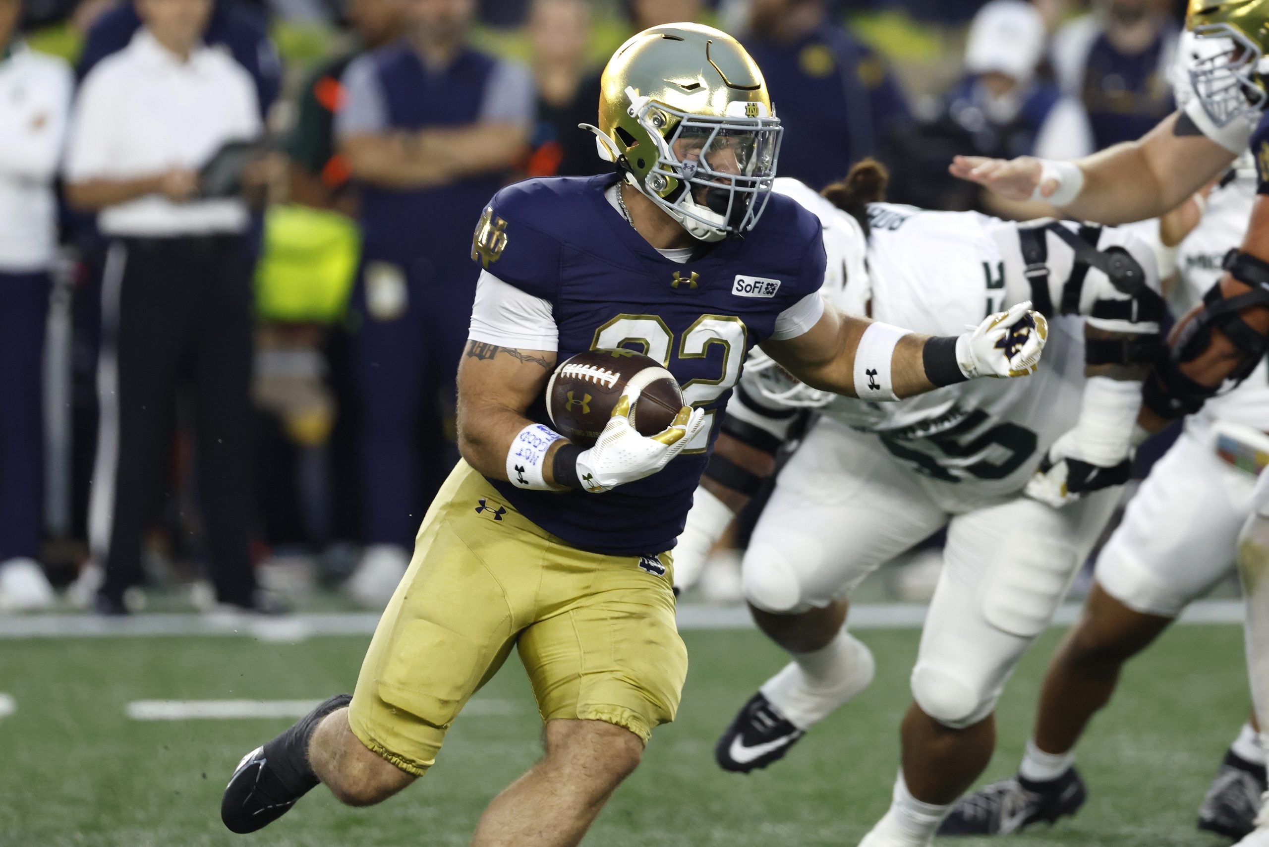 Sep 19, 2026; South Bend, Indiana, USA; Notre Dame Fighting Irish running back Aneyas Williams (22) runs against the Michigan State Spartans during the first half at Notre Dame Stadium.