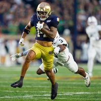 Notre Dame wide receiver Micah Gilbert (14) rushes the ball during a NCAA football game against Michigan State at Notre Dame Stadium on Saturday, Sept. 19, 2026, in South Bend.