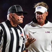 LSU head coach Lane Kiffin talks with an official during a college football game between Ole Miss and LSU at Vaught Hemingway Stadium in Oxford, Miss., on Saturday, Sept. 19, 2026.