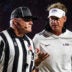 LSU head coach Lane Kiffin talks with an official during a college football game between Ole Miss and LSU at Vaught Hemingway Stadium in Oxford, Miss., on Saturday, Sept. 19, 2026.