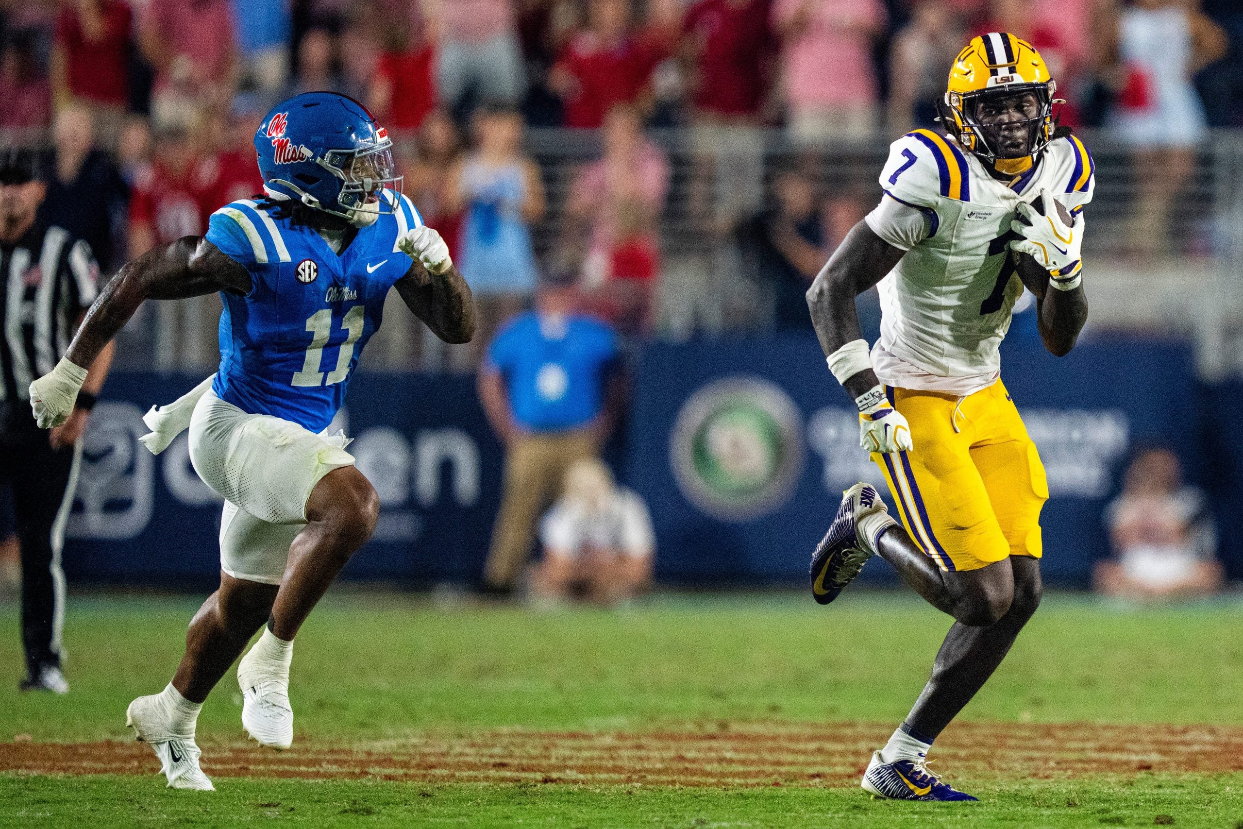 LSU tight end Trey'Dez Green (7) carries the ball during a college football game between Ole Miss and LSU at Vaught Hemingway Stadium in Oxford, Miss., on Saturday, Sept. 19, 2026. Ole Miss defeated LSU 32-24.