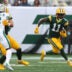 Sep 20, 2026; East Rutherford, New Jersey, USA; Green Bay Packers wide receiver Jayden Reed (11) runs after the catch against the New York Jets during the first quarter at MetLife Stadium.