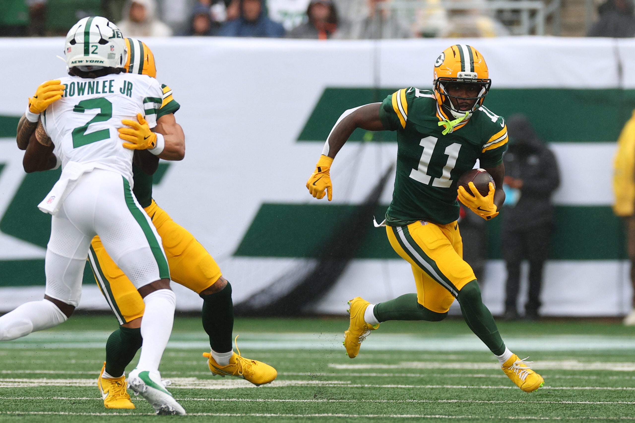 Sep 20, 2026; East Rutherford, New Jersey, USA; Green Bay Packers wide receiver Jayden Reed (11) runs after the catch against the New York Jets during the first quarter at MetLife Stadium.
