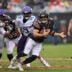 Sep 20, 2026; Chicago, Illinois, USA; Chicago Bears quarterback Caleb Williams (18) scrambles against Minnesota Vikings linebacker Dallas Turner (15) and defensive tackle Levi Drake Rodriguez (50) during the first quarter at Soldier Field.