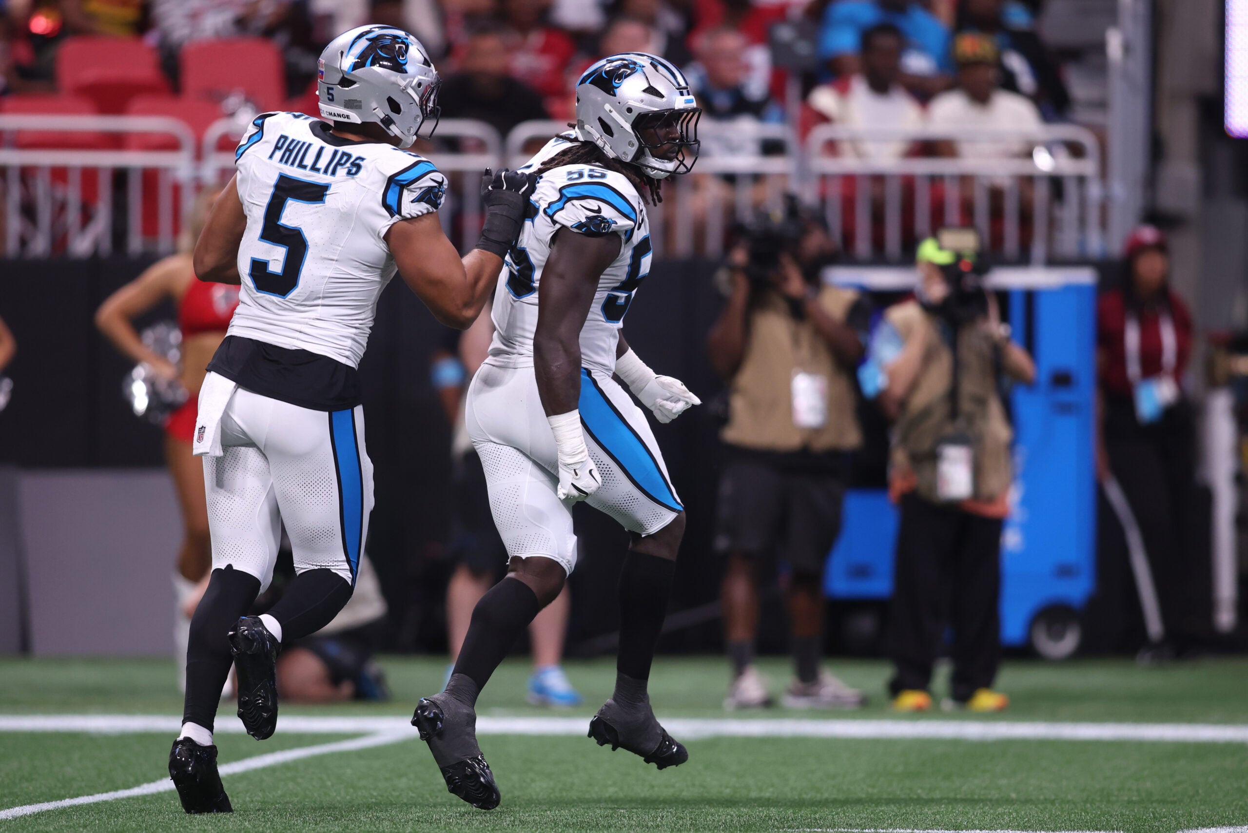 Sep 20, 2026; Atlanta, Georgia, USA; Carolina Panthers linebacker Devin Lloyd (55) celebrates a sack during the second quarter against the Atlanta Falcons at Mercedes-Benz Stadium.
