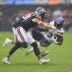 Sep 20, 2026; Chicago, Illinois, USA; Minnesota Vikings running back Aaron Jones Sr. (33) is tacked by Chicago Bears cornerback Tyrique Stevenson (29) and safety Dillon Thieneman (31) during the first half at Soldier Field.