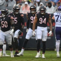 Sep 20, 2026; Chicago, Illinois, USA; Chicago Bears defensive end Montez Sweat (98) reacts with teammates after a defensive play against the Minnesota Vikings during the second half at Soldier Field.