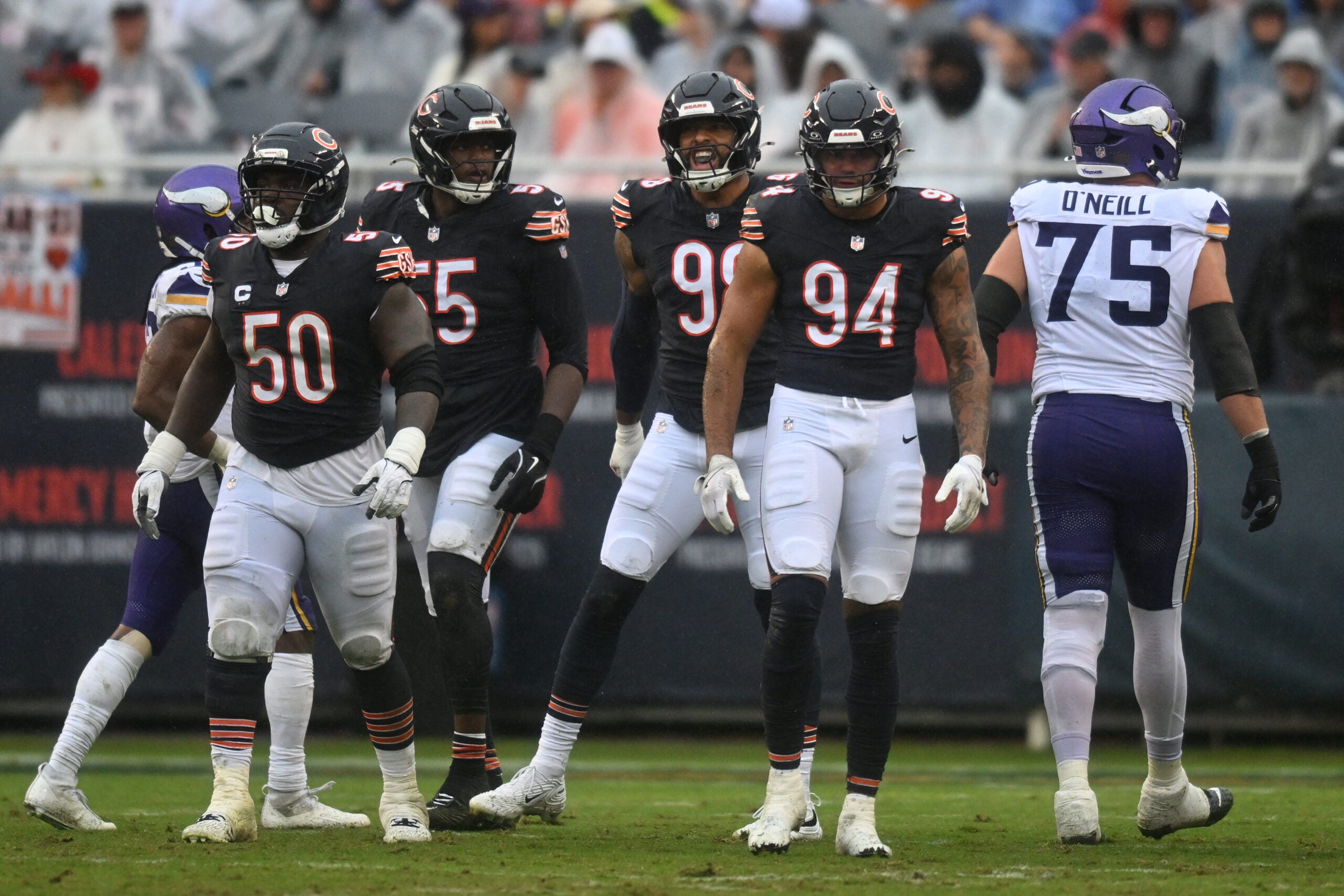 Sep 20, 2026; Chicago, Illinois, USA; Chicago Bears defensive end Montez Sweat (98) reacts with teammates after a defensive play against the Minnesota Vikings during the second half at Soldier Field.