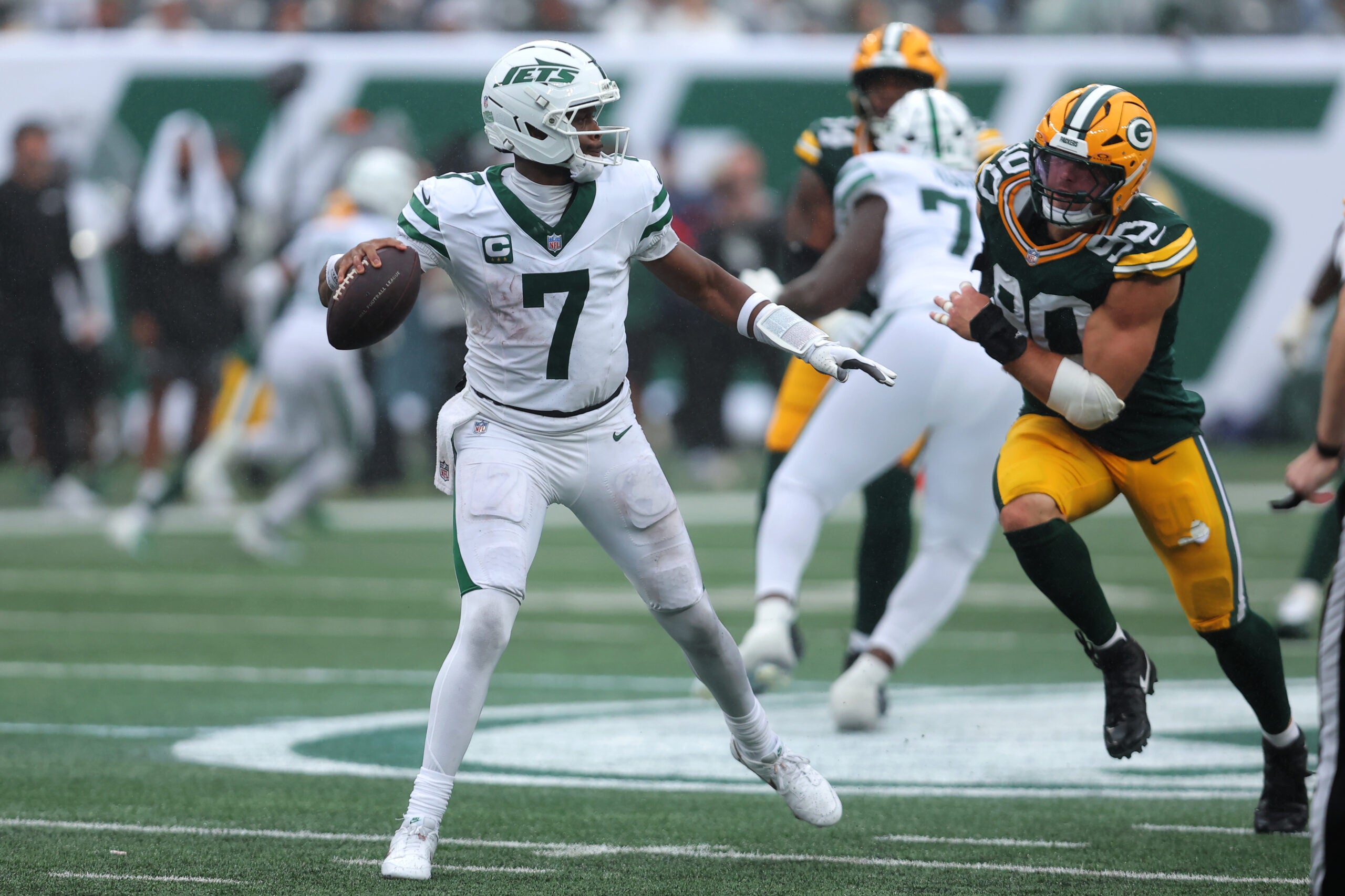 Sep 20, 2026; East Rutherford, New Jersey, USA; Green Bay Packers defensive end Lukas Van Ness (90) applies the pressure on New York Jets quarterback Geno Smith (7) during the third quarter at MetLife Stadium.
