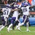 Sep 20, 2026; Chicago, Illinois, USA; Minnesota Vikings linebacker Dallas Turner (obscured) celebrates with linebacker Blake Cashman (51) and quarterback J.J. McCarthy (9) after sacking Chicago Bears quarterback Tyson Bagent (not pictured) to end the game in the second half at Soldier Field.