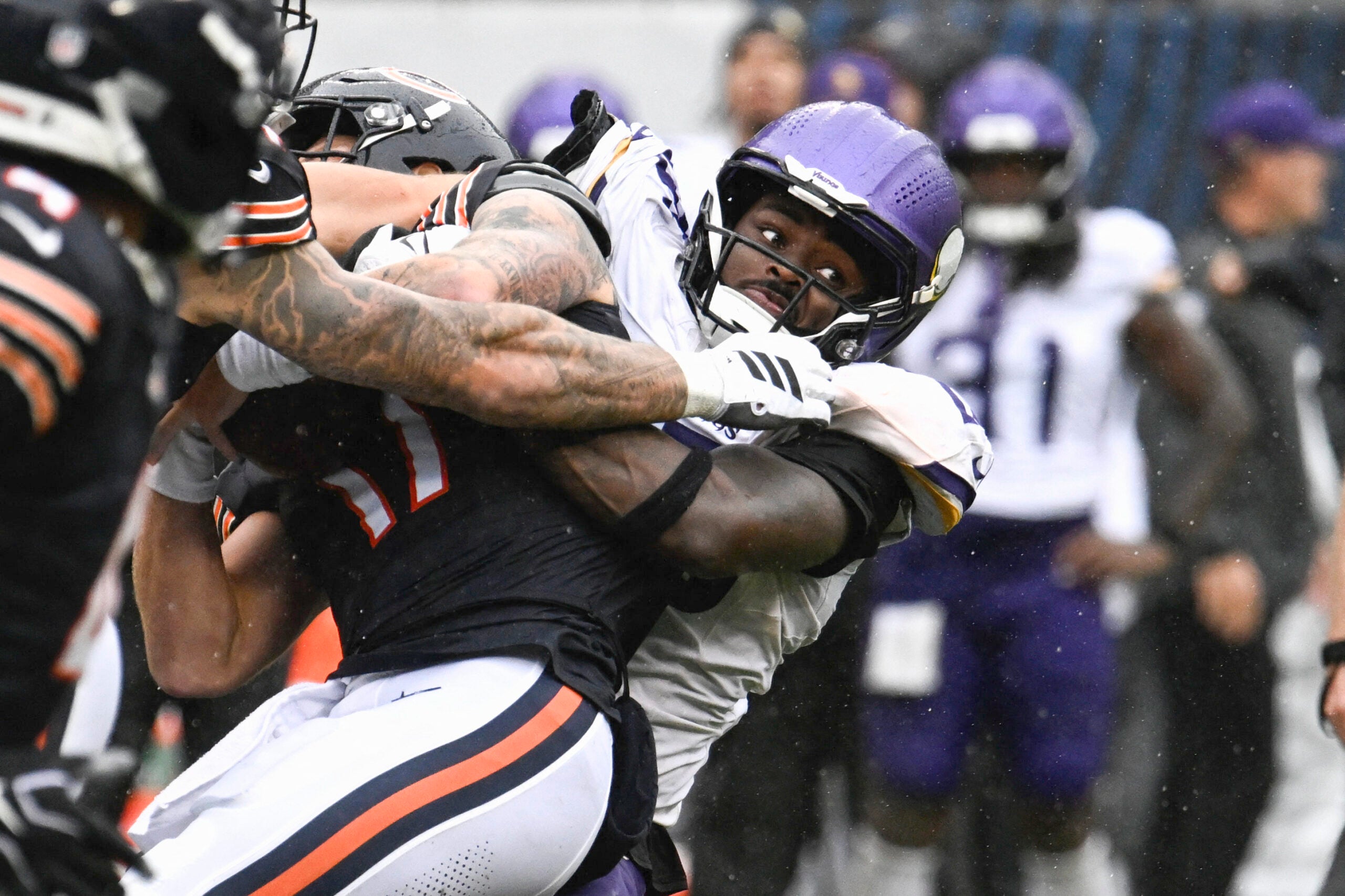 Sep 20, 2026; Chicago, Illinois, USA; Minnesota Vikings linebacker Dallas Turner (15) sacks Chicago Bears quarterback Tyson Bagent (17) to end the game in the second half at Soldier Field.
