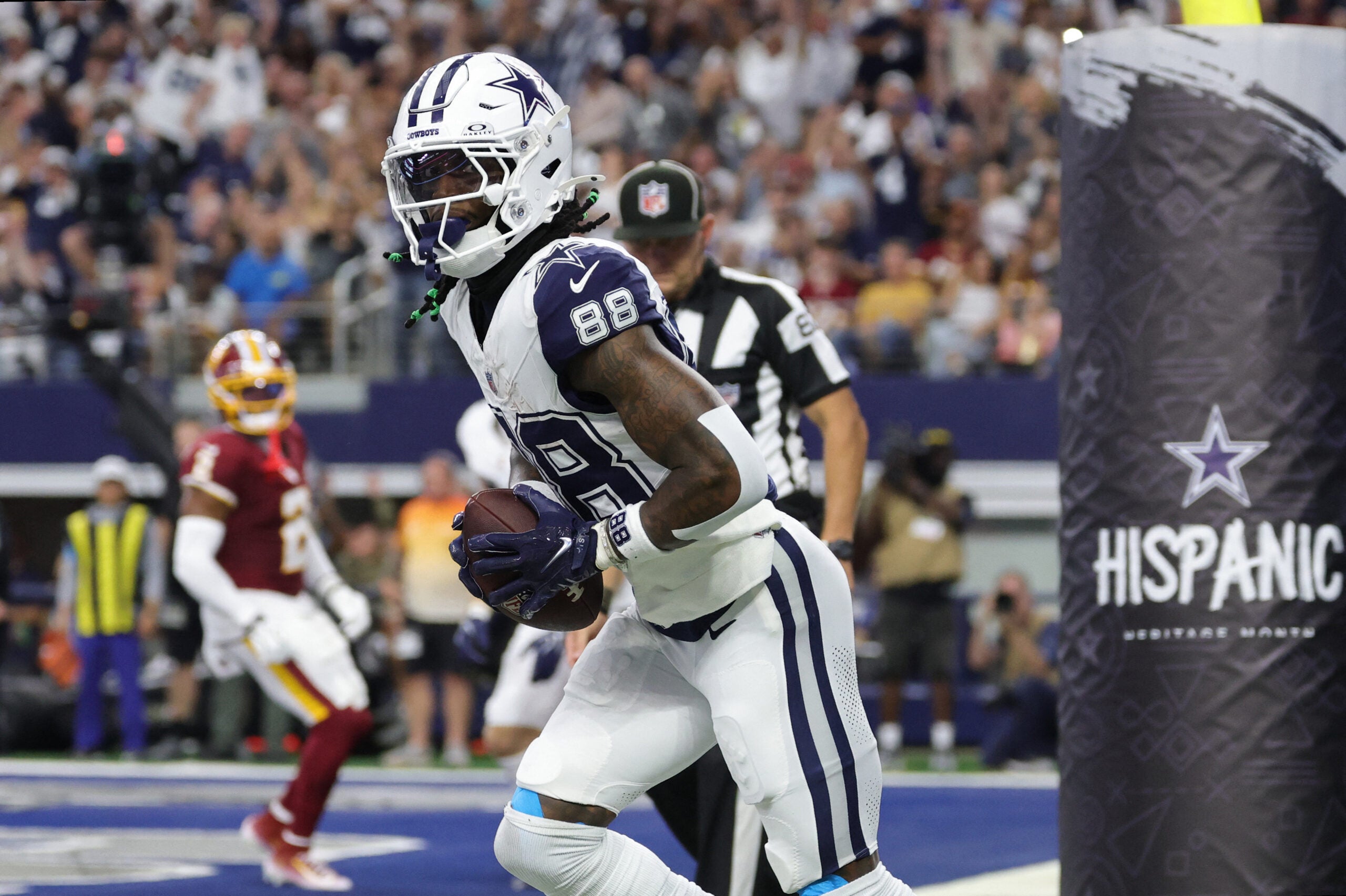 Sep 20, 2026; Arlington, Texas, USA; Dallas Cowboys wide receiver CeeDee Lamb (88) reacts after catching a three-yard touchdown pass thrown by quarterback Dak Prescott (not pictured) against the Washington Commanders during the first quarter at AT&T Stadium.