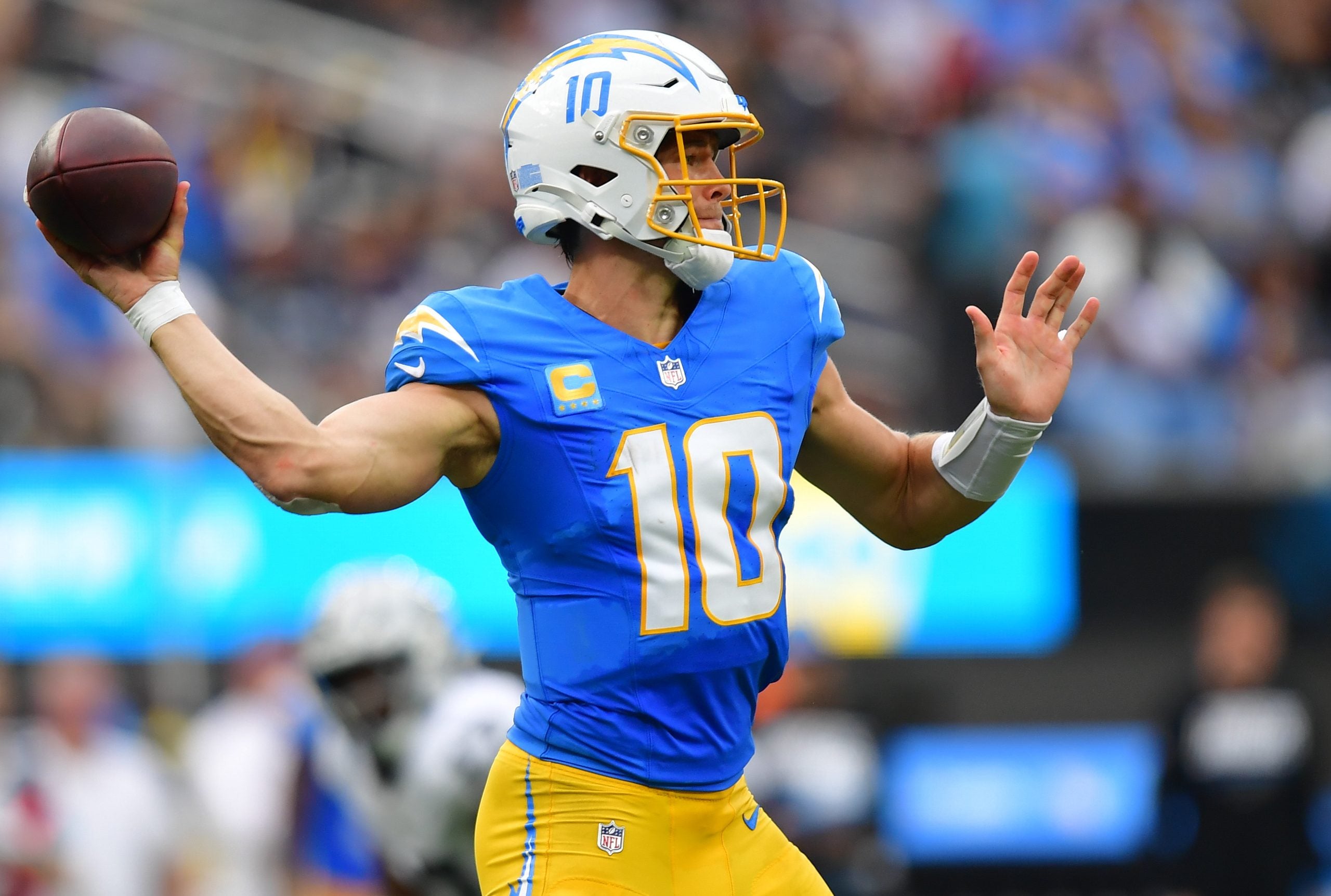 Sep 20, 2026; Inglewood, California, USA; Los Angeles Chargers quarterback Justin Herbert (10) throws a pass against the Las Vegas Raiders during the first half at SoFi Stadium.