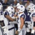 Sep 20, 2026; Arlington, Texas, USA; Dallas Cowboys tight end Jake Ferguson (87) celebrates with teammates after scoring a touchdown against the Washington Commanders during the first half at AT&T Stadium.