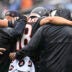Sep 20, 2026; Chicago, Illinois, USA; Chicago Bears quarterback Caleb Williams (18) is helped off the field with an apparent injury against the Minnesota Vikings during the second half at Soldier Field.