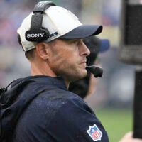 Sep 20, 2026; Chicago, Illinois, USA; Chicago Bears head coach Ben Johnson watches game play against the Minnesota Vikings during the second half at Soldier Field.