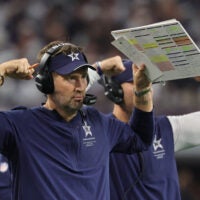 Sep 20, 2026; Arlington, Texas, USA; Dallas Cowboys head coach Brian Schottenheimer instructs his team from the sideline against the Washington Commanders during the second half at AT&T Stadium.