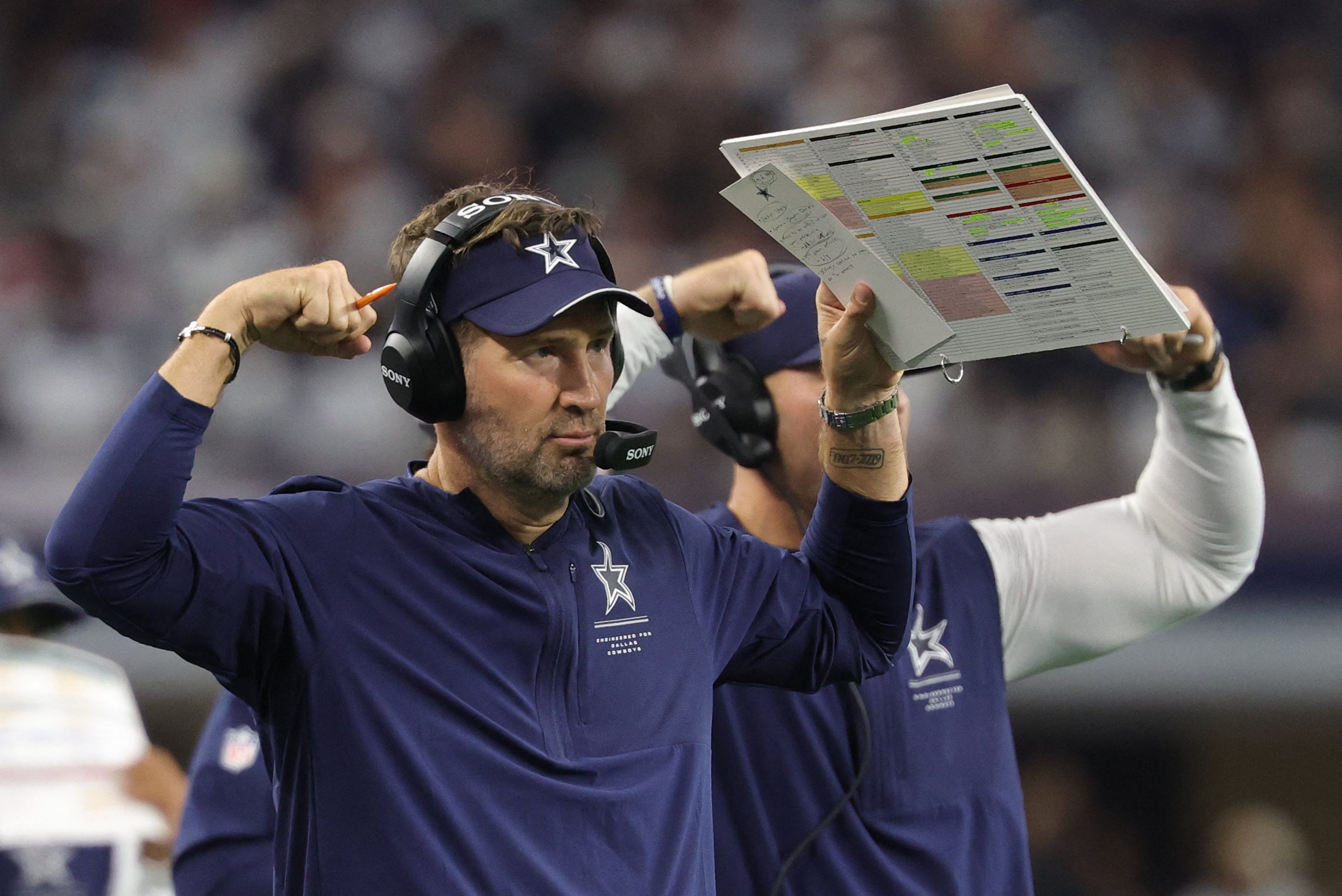 Sep 20, 2026; Arlington, Texas, USA; Dallas Cowboys head coach Brian Schottenheimer instructs his team from the sideline against the Washington Commanders during the second half at AT&T Stadium.