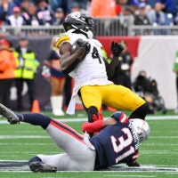 September 20, 2026; Foxborough, Massachusetts, USA; New England Patriots safety Kevin Byard III (31) tackles Pittsburgh Steelers wide receiver DK Metcalf (4) during the second half at Gillette Stadium.
