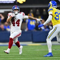 Sep 21, 2026; Inglewood, California, USA; New York Giants running back Cam Skattebo (44) runs against Los Angeles Rams safety Quentin Lake (37) during the second quarter at SoFi Stadium.