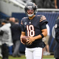 Sep 20, 2026; Chicago, Illinois, USA; Chicago Bears quarterback Caleb Williams (18) looks on during warmups before the game against the Minnesota Vikings at Soldier Field.