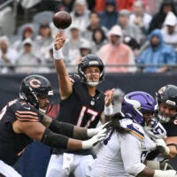 Sep 20, 2026; Chicago, Illinois, USA; Chicago Bears quarterback Tyson Bagent (17) passes the ball against the Minnesota Vikings during the second half at Soldier Field.