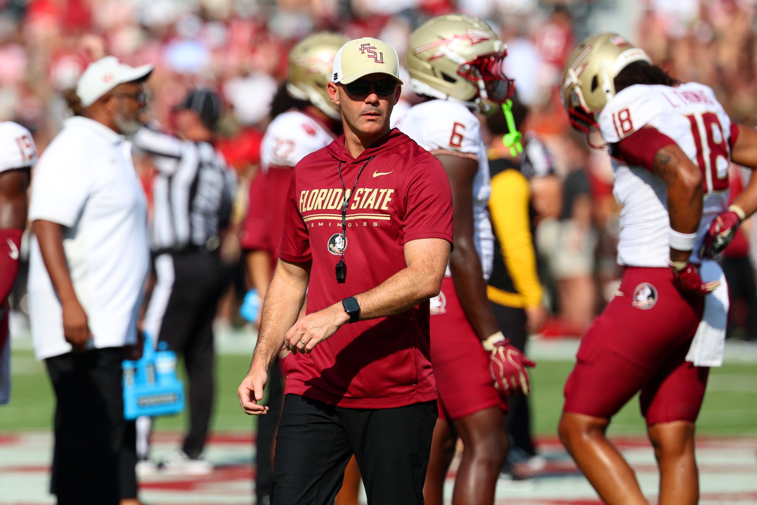 Sep 19, 2026; Tuscaloosa, Alabama, USA; Florida State Seminoles head coach Mike Norvell warms up his team before a game against the Alabama Crimson Tide at Saban Field at Bryant-Denny Stadium.