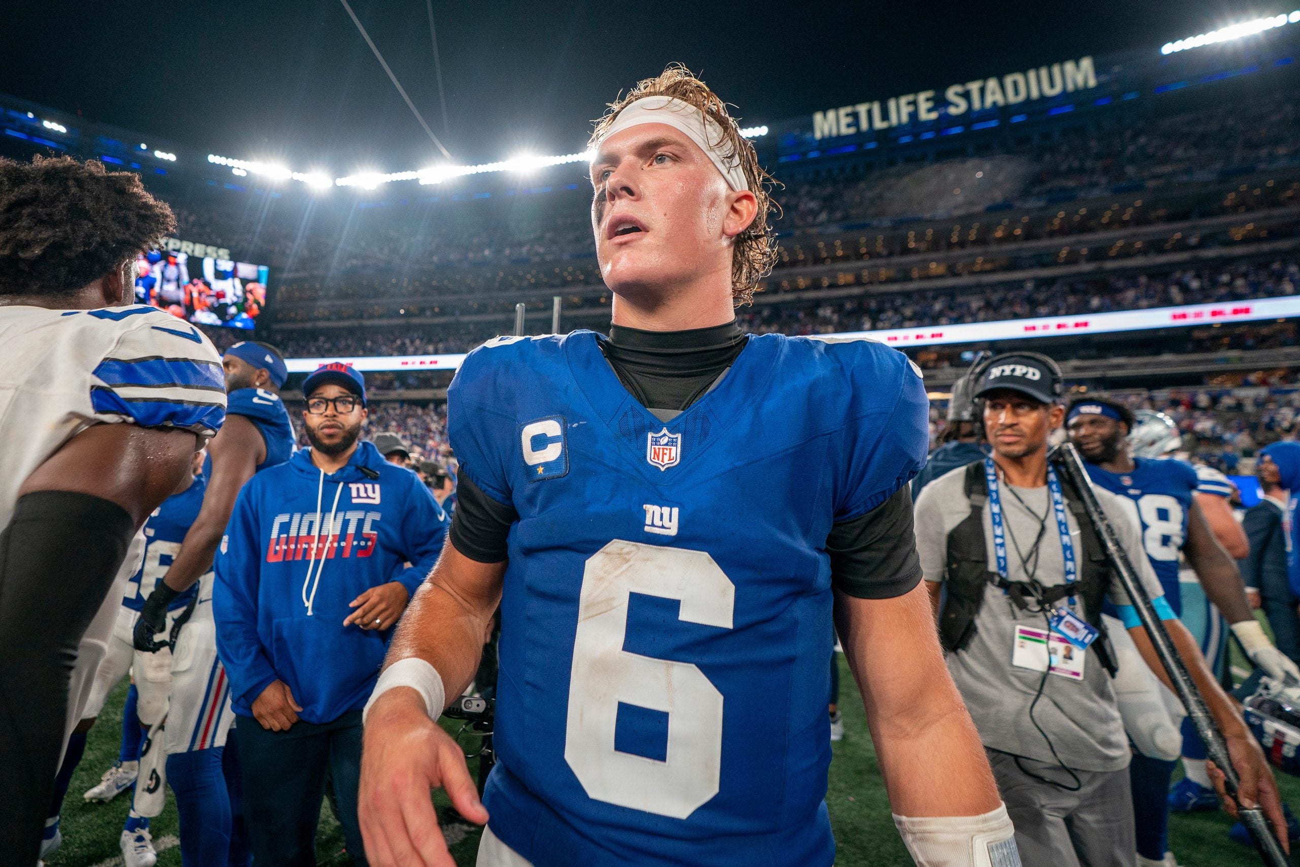 New York Giants quarterback Jaxson Dart (6) walks off the field following a 28-20 victory during a week one opening game between the New York Giants and Dallas Cowboys at Metlife Stadium on Sunday, Sept. 13, 2026, in East Rutherford, NJ.