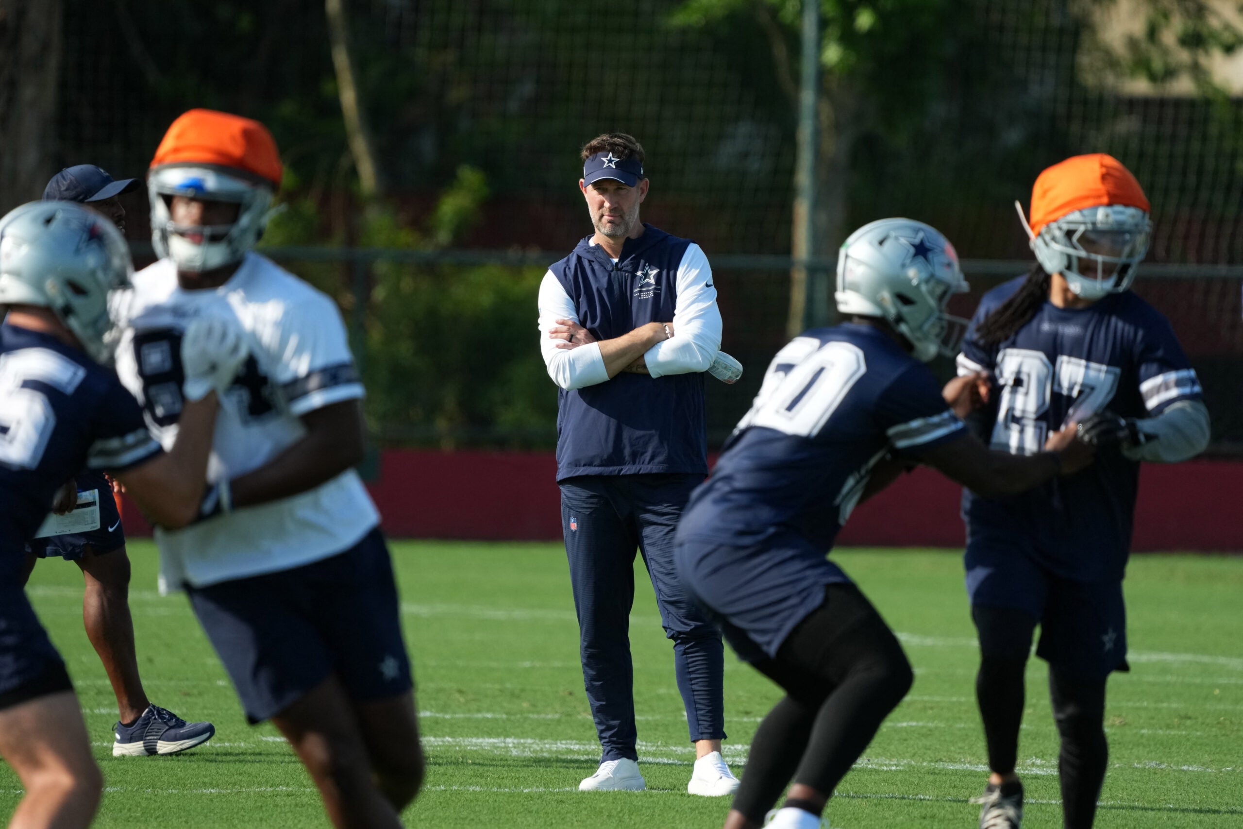 Sep 25, 2026; Rio de Janeiro, Brazil; Dallas Cowboys head coach Brian Schottenheimer watches during practice at the Clube de Regatas do Flamengo training ground.