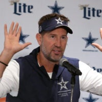 Sep 25, 2026; Rio de Janeiro, Brazil; Dallas Cowboys head coach Brian Schottenheimer reacts at press conference at the Clube de Regatas do Flamengo training ground.