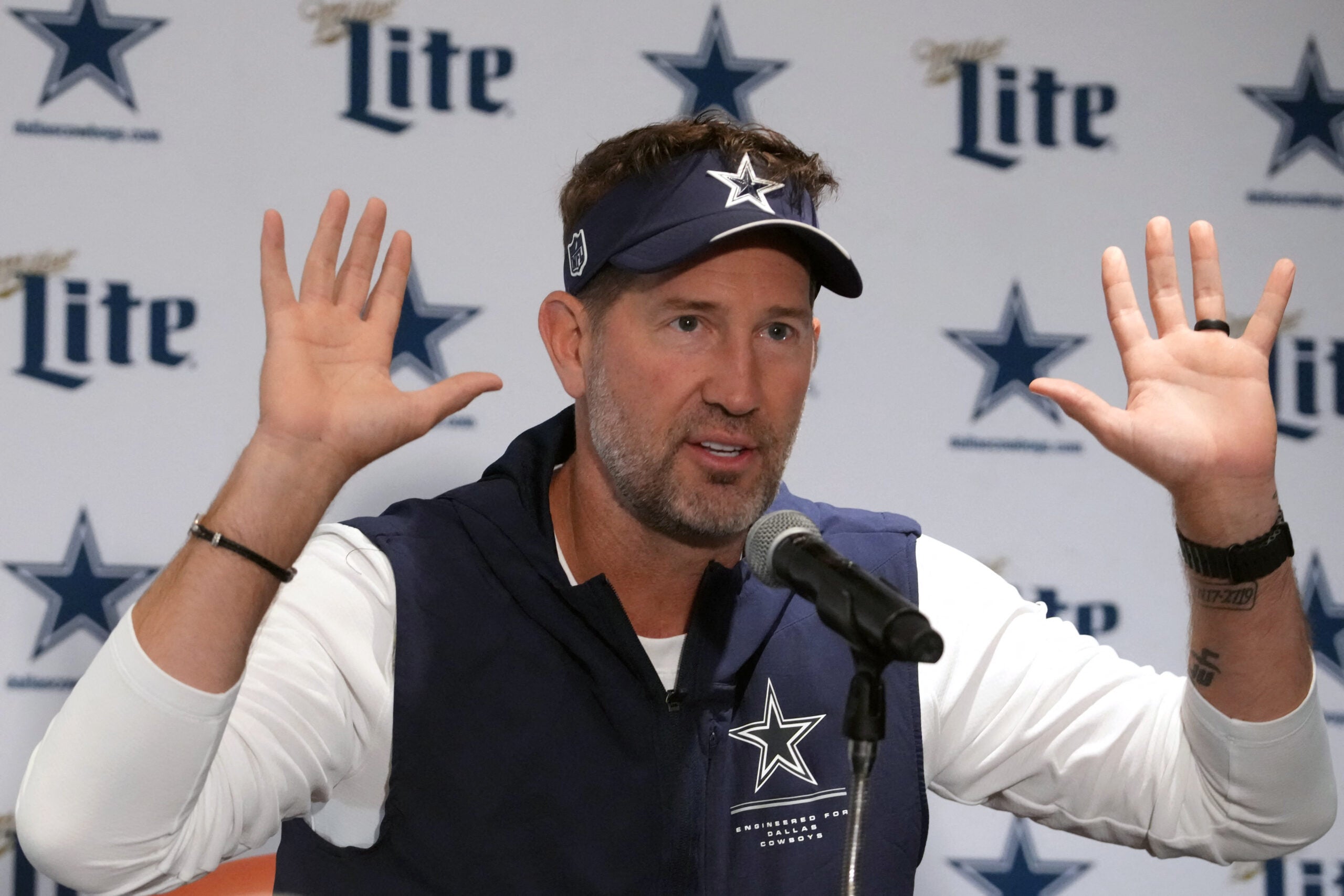 Sep 25, 2026; Rio de Janeiro, Brazil; Dallas Cowboys head coach Brian Schottenheimer reacts at press conference at the Clube de Regatas do Flamengo training ground.