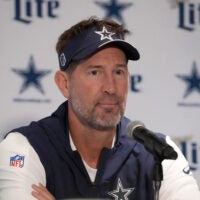 Sep 25, 2026; Rio de Janeiro, Brazil; Dallas Cowboys head coach Brian Schottenheimer reacts at press conference at the Clube de Regatas do Flamengo training ground.