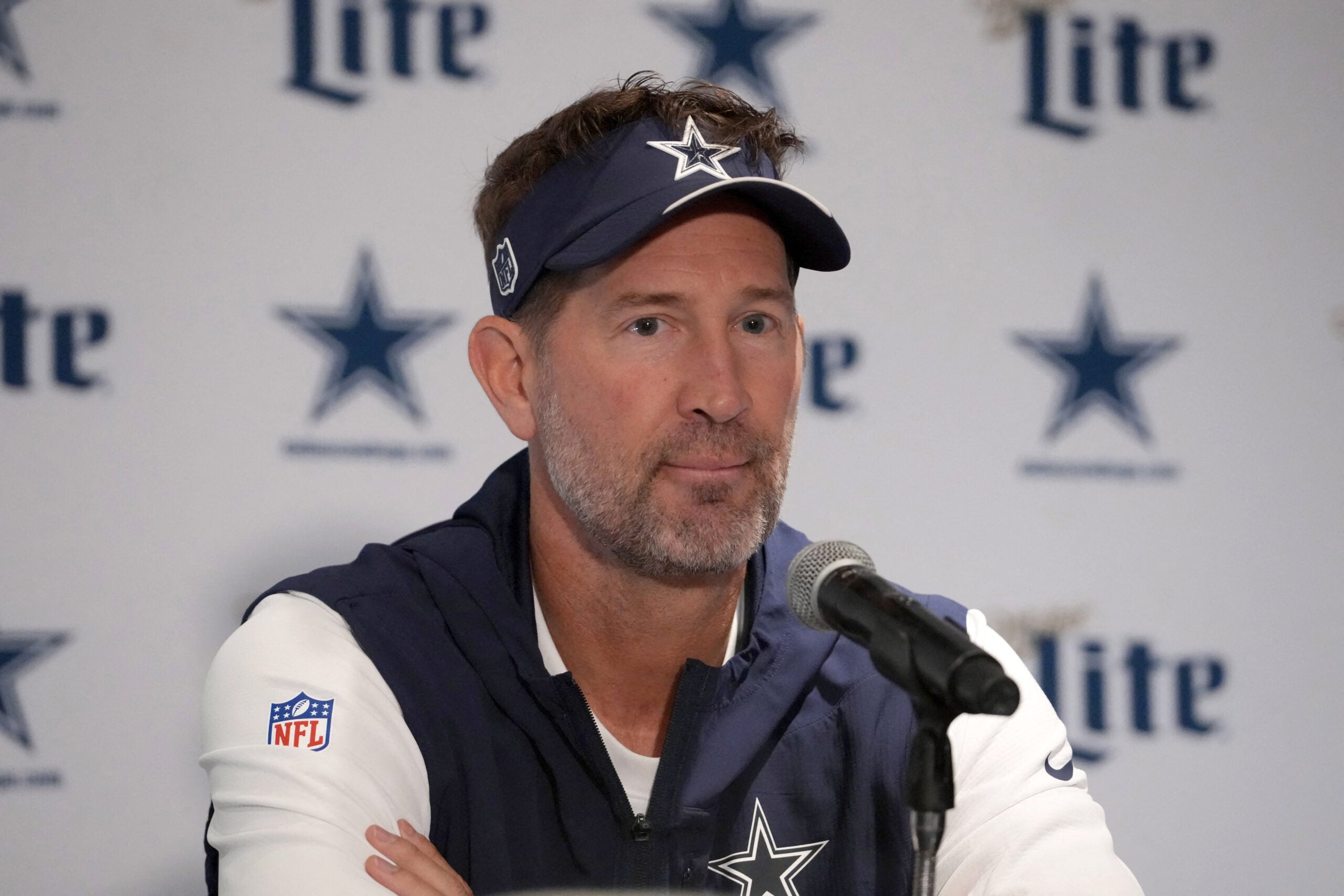 Sep 25, 2026; Rio de Janeiro, Brazil; Dallas Cowboys head coach Brian Schottenheimer reacts at press conference at the Clube de Regatas do Flamengo training ground.