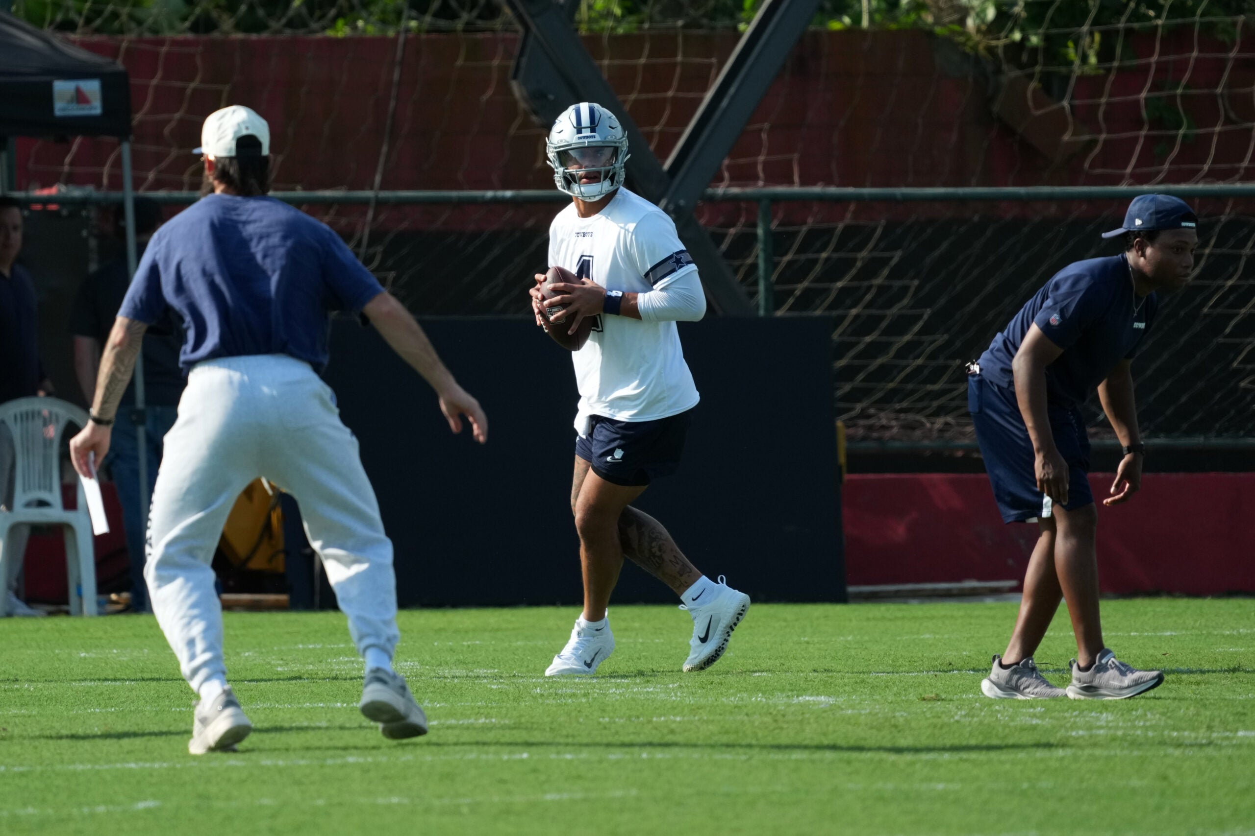 Sep 25, 2026; Rio de Janeiro, Brazil; Dallas Cowboys quarterback Dak Prescott (4) throws the ball during practice at the Clube de Regatas do Flamengo training ground.