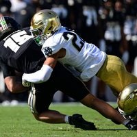 Sep 26, 2026; West Lafayette, Indiana, USA; Purdue Boilermakers quarterback Ryan Browne (15) is sacked by Notre Dame Fighting Irish safety Joey O'Brien (20) in the second quarter at Ross-Ade Stadium.