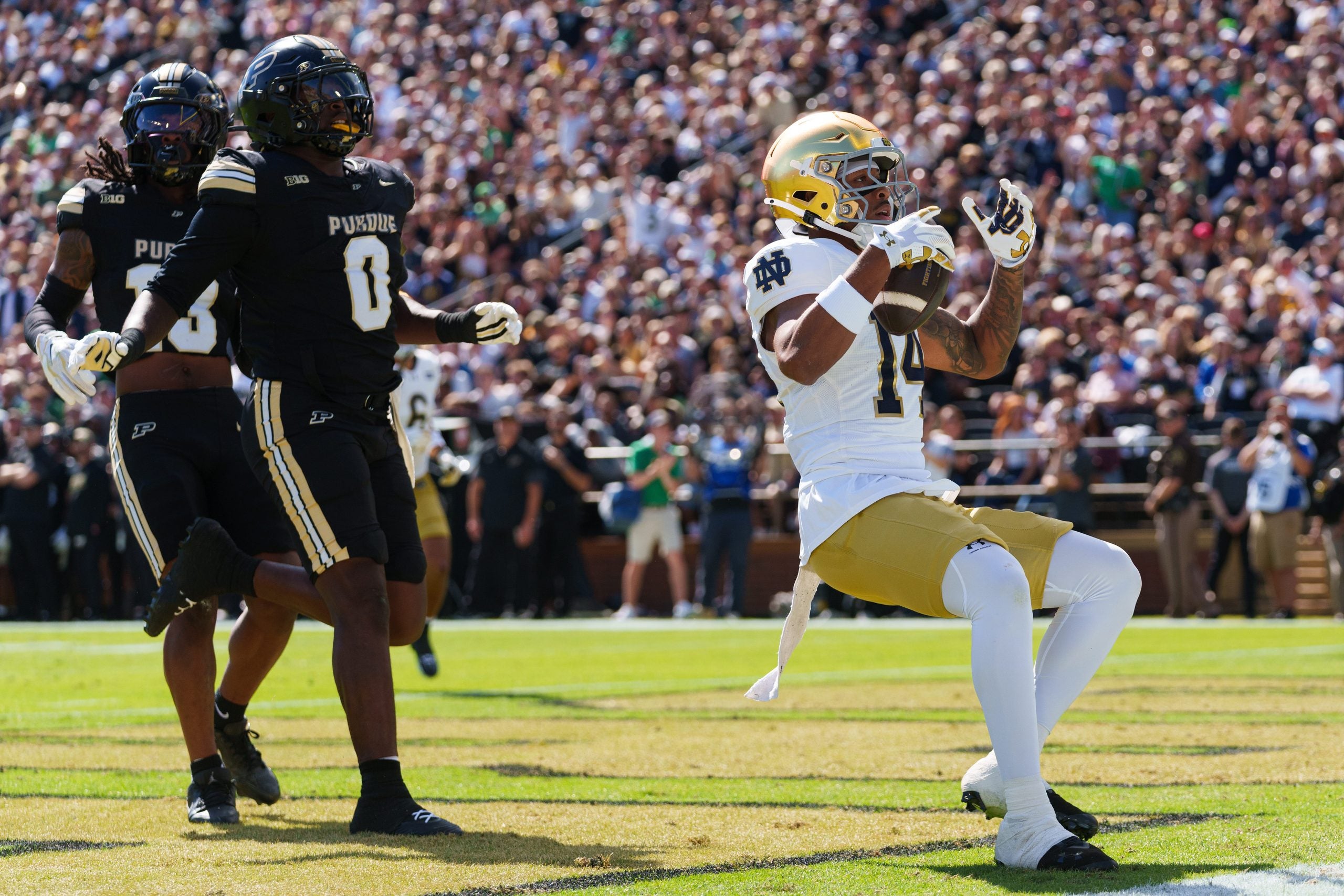 Notre Dame wide receiver Micah Gilbert (14) scores a touchdown during a NCAA football game against Purdue at Ross-Ade Stadium on Saturday, Sept. 26, 2026, in West Lafayette.