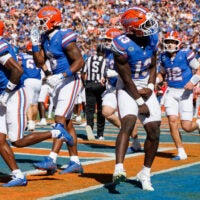 Sep 26, 2026; Gainesville, Florida, USA; Florida Gators running back Jadan Baugh (13) reacts after scoring a touchdown against the Mississippi Rebels during the first half at Ben Hill Griffin Stadium.